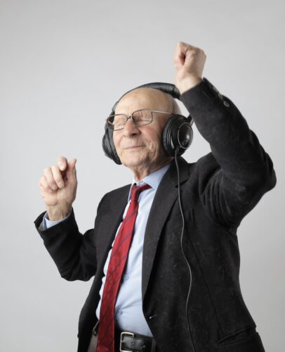 man in black jacket wearing black headphones